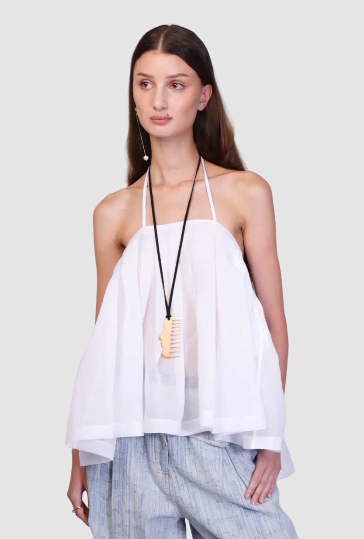 top falda multifuncional con bolsas, top que se hace falda con bolsas, top corte halter, falda tableada con vuelo, falda con bolsas, falda blanca, falda negra, diseño mexicano, hecho a mano, hecho en México